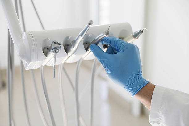 Professional Tooth Extraction technician working in Hampton, VA